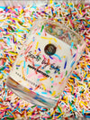 soy wax birthday candle adorned with colourful sprinkles perfect for adding a festive and eco friendly touch to your celebration  